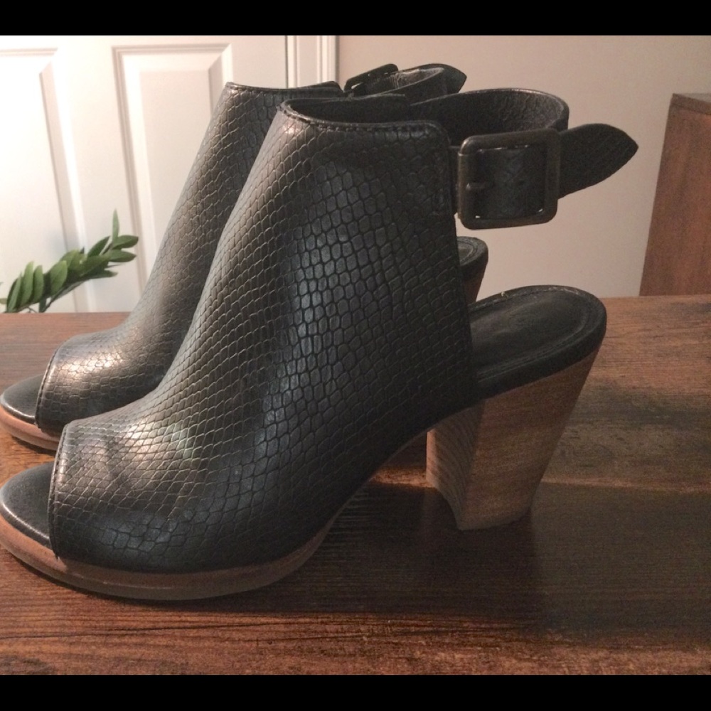 UGG Black Leather peep-toe booties.